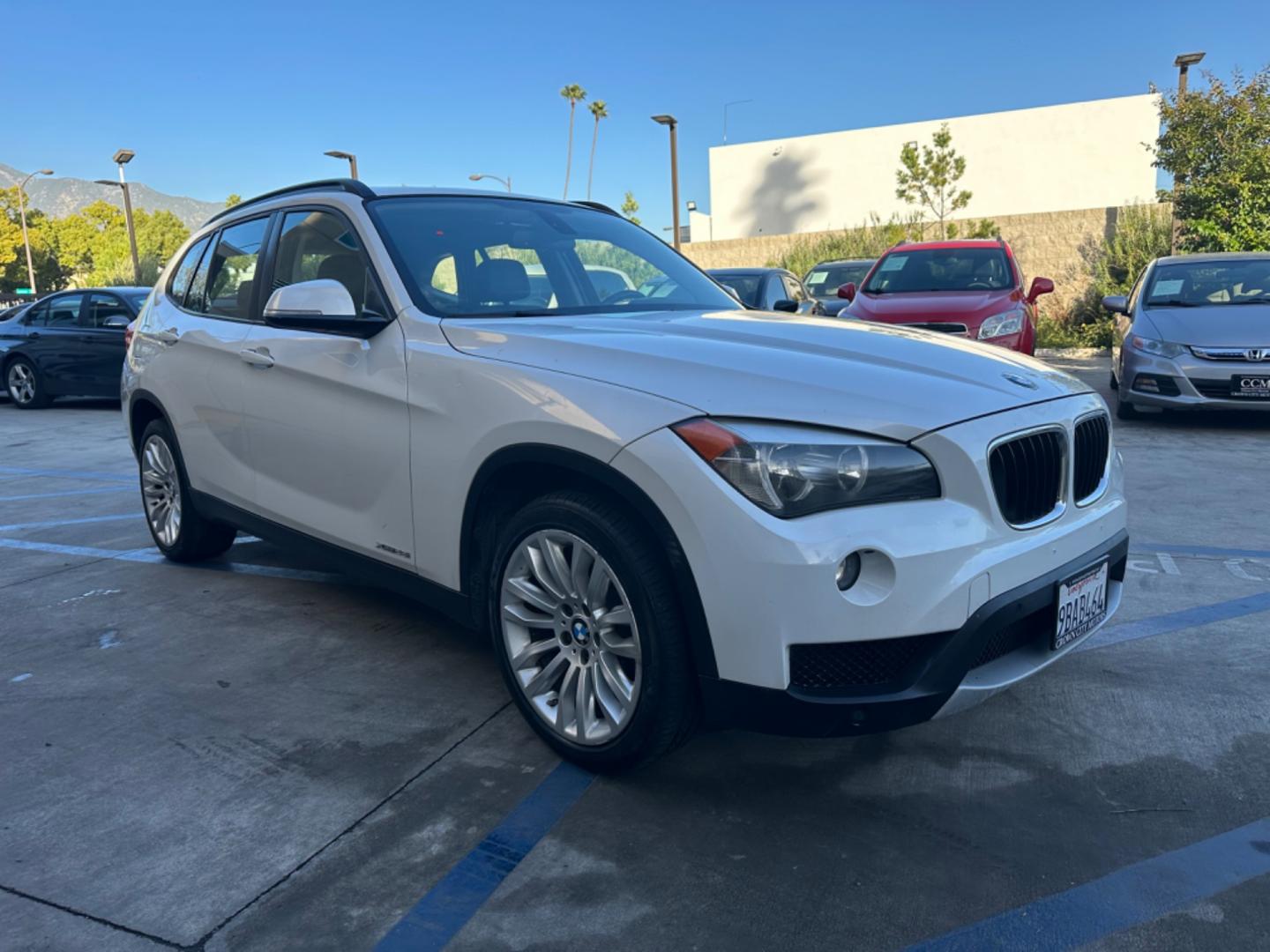 2014 WHITE /Black BMW X1 Leather (WBAVL1C56EV) with an 4 Cylinders engine, AUTOMATIC transmission, located at 30 S. Berkeley Avenue, Pasadena, CA, 91107, (626) 248-7567, 34.145447, -118.109398 - Don't let bad credit or financial setbacks hold you back from owning a luxury SUV like the 2014 BMW X1 xDrive28i. At our BHPH dealership, we're here to make the car-buying process as smooth and stress-free as possible. We invite you to visit our dealership in Pasadena, CA, to explore our inventory o - Photo#6